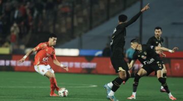 حكم مواجهة الأهلي والزمالك في الدوري: تحليل شامل وتفاصيل مثير